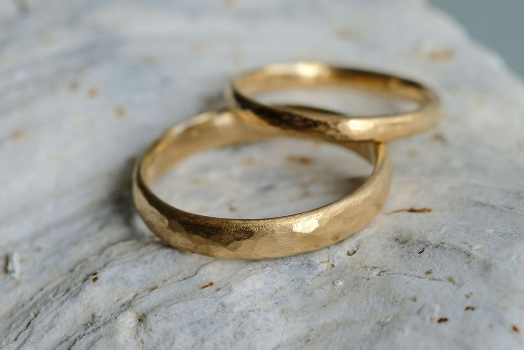 Polished hammered wedding ring set