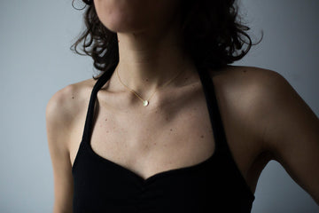 <transcy>Goldkette mit Plättchen</transcy>